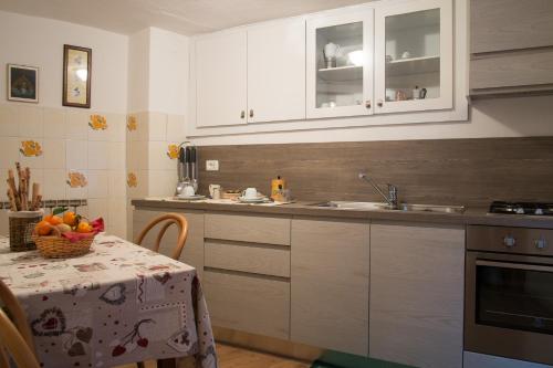 Η κουζίνα ή μικρή κουζίνα στο Appartamento Le Bon Reveil