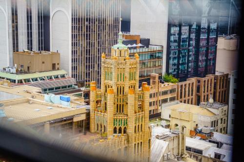 a model of a tall building in a city at Sydney CBD luxury high level 2 bedroom2 bathroom condo with City view- Pool Gym 4 in Sydney
