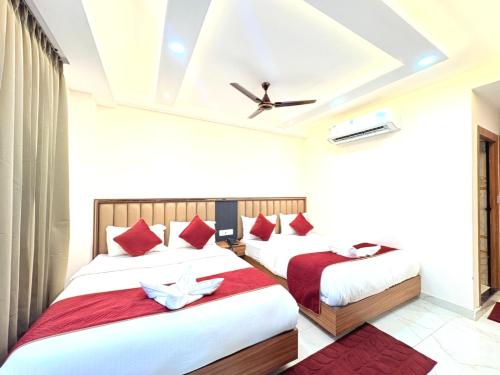 En eller flere senge i et værelse på The Gonesh Hotel