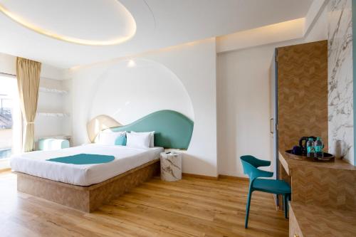 Postel nebo postele na pokoji v ubytování Palette The Moon Hotel by CheckIn Goa