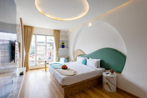 Postel nebo postele na pokoji v ubytování Palette The Moon Hotel by CheckIn Goa