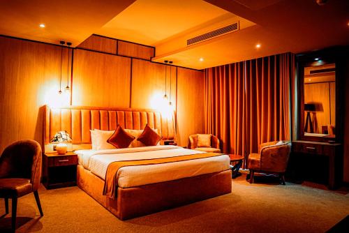 Postel nebo postele na pokoji v ubytování Ramadia Grand Holiday Resort