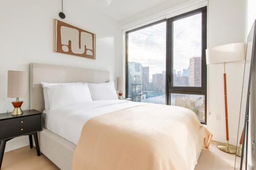 Postel nebo postele na pokoji v ubytování Blueground Downtown Brooklyn rooftop nr Brooklyn Bridge NYC-2186