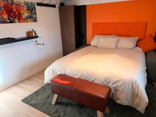 Кровать или кровати в номере Smarte Wohnung am Bahnhof