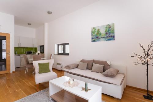 Khu vực ghế ngồi tại Green Apartments Bjelašnica