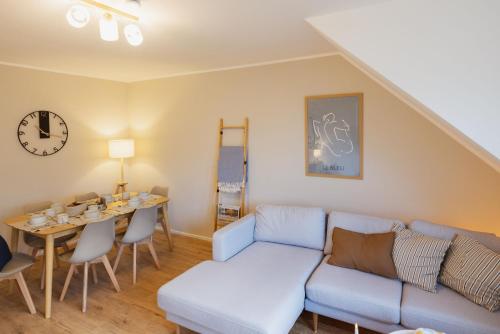 Posezení v ubytování HYGGE HOMES - Apartment 'Lilla Lycka'