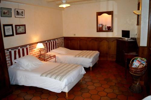 Postel nebo postele na pokoji v ubytování la Maison d'Odette et Daniel