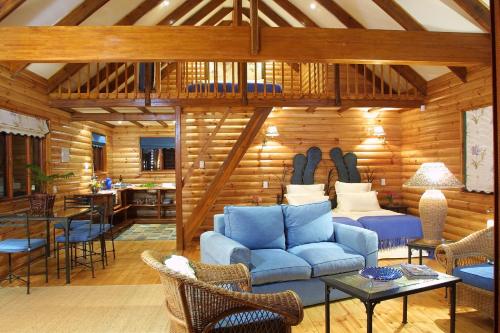 Area soggiorno di The Fernery Lodge & Spa
