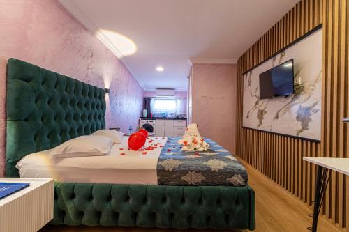 Ένα ή περισσότερα κρεβάτια σε δωμάτιο στο Süper Stay Halkalı