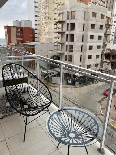 En balkon eller terrasse på Departamento Senderos Mar y Parque A