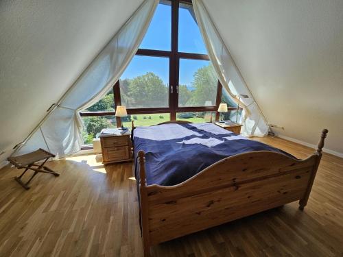 En eller flere senge i et værelse på Ostseepanorama