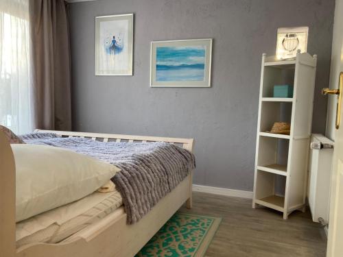 Postel nebo postele na pokoji v ubytování Häuschen am Meer