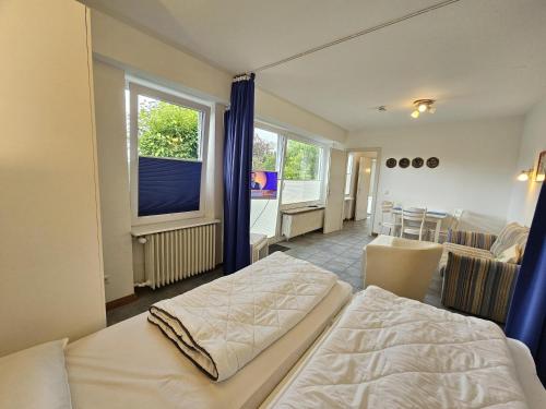 Postel nebo postele na pokoji v ubytování Unterdeck