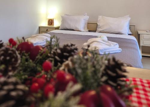 Ένα ή περισσότερα κρεβάτια σε δωμάτιο στο Creta Irini's Rooms3