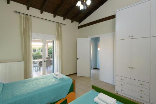 Postel nebo postele na pokoji v ubytování Doctor'S House by PosarelliVillas