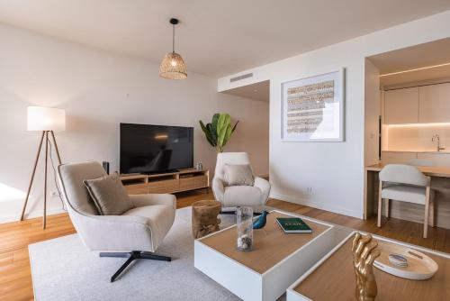 Et tv og/eller underholdning på Ocean View Luxury Bayline Apartment