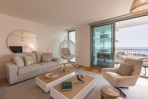 Et opholdsområde på Ocean View Luxury Bayline Apartment