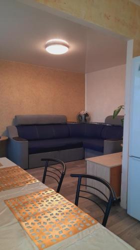 Χώρος καθιστικού στο Two-Bedroom Apartment Pokrovskaya, 48