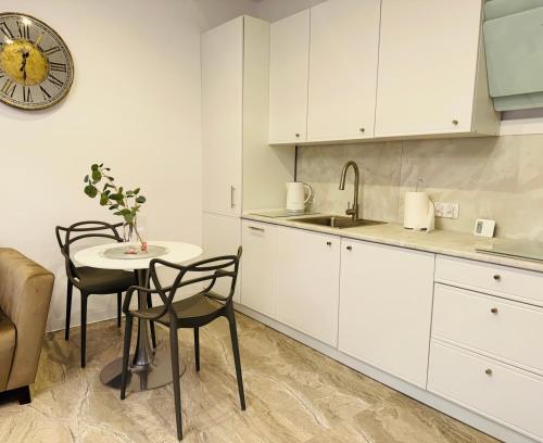 Een keuken of kitchenette bij Pastello & Bianco