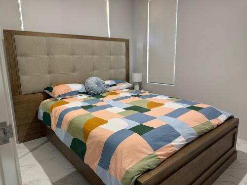 En eller flere senge i et værelse på Wellard Nest- Perth