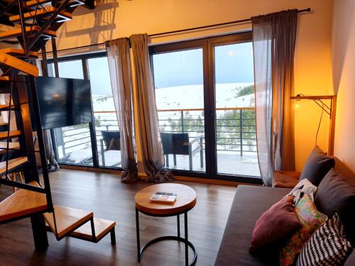 Posezení v ubytování HUUT