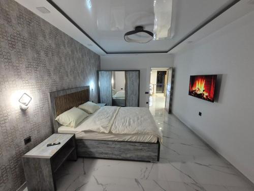 Postel nebo postele na pokoji v ubytování Guest House