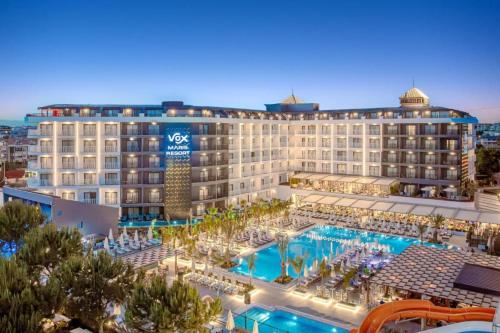 a large hotel with a large pool in front of it at Vox Maris Resort - Ultra All Inclusive in Side