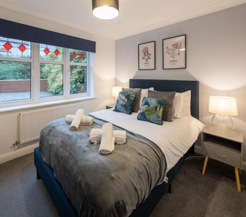 En eller flere senge i et værelse på Park House By Cliftonvalley Apartments