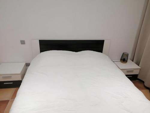 En eller flere senge i et værelse på A Casa Assulanata Cinto