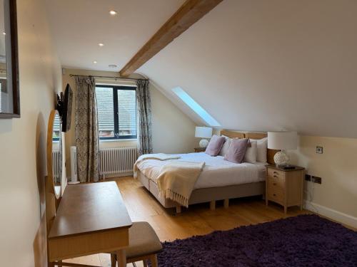 En eller flere senge i et værelse på Rosehaven House at Pudleston Court