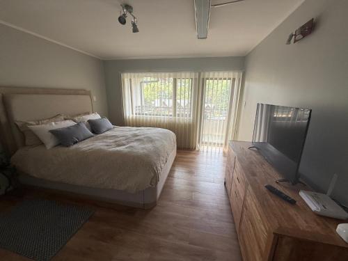 Postel nebo postele na pokoji v ubytování La Marina 19 Edificio Los Coigües