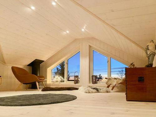 Et opholdsområde på Family Cabin With Views In Lygnalia