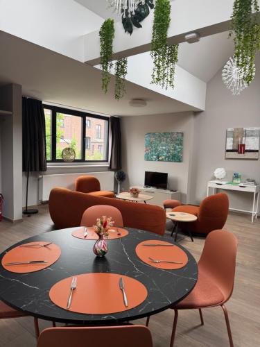 Et opholdsområde på Appartement De Pereboom