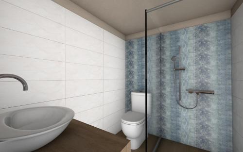 un baño con inodoro y ducha en Katoi suite, en Éxo Khóra