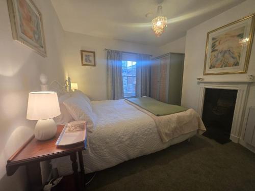 En eller flere senge i et værelse på Fisherman's Cottage, Cromer