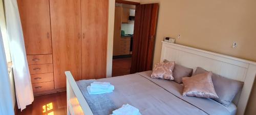 En eller flere senge i et værelse på Tranquility on Musgrave