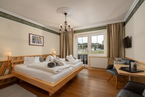 Postel nebo postele na pokoji v ubytování Kobaldhof