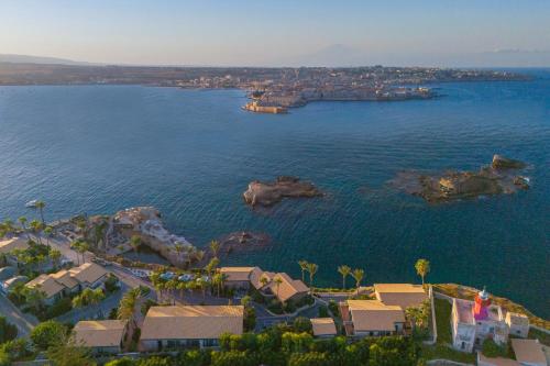 an aerial view of a large body of water at Minareto in Siracusa