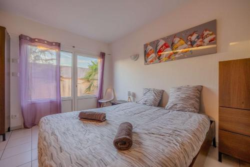 Ένα ή περισσότερα κρεβάτια σε δωμάτιο στο Dunes Apart-Hotel - Kiwi Residence