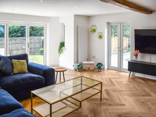 TV a/nebo společenská místnost v ubytování Faith Cottage