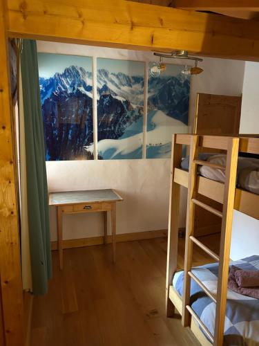 Cama o camas de una habitación en Chalet les vergers