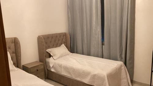 En eller flere senge i et værelse på ADAN beach Aourir