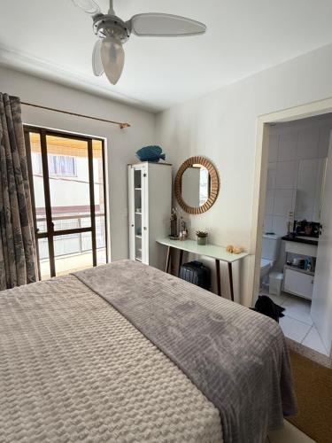 En eller flere senge i et værelse på Apto com vista mar a 70 metros