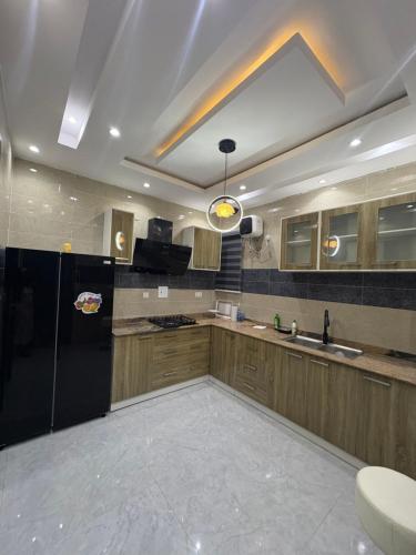 Køkken eller tekøkken på Emerald Apartment