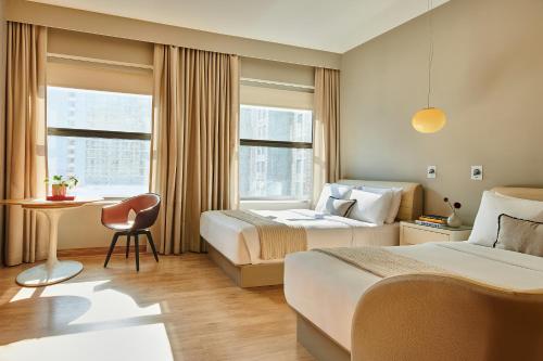 Ένα ή περισσότερα κρεβάτια σε δωμάτιο στο Sports Illustrated Resorts Chicago