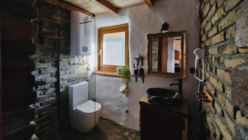 Koupelna v ubytování Kuća od slame PANONSKI MORNAR