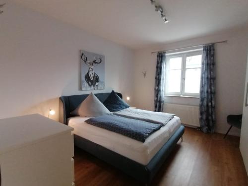 Postel nebo postele na pokoji v ubytování Allgäu-Idyll