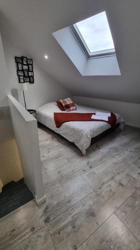 En eller flere senge i et værelse på NALAN Orrygeois, SPA, Sauna, Proche Asterix