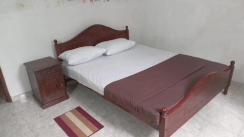 Giường trong phòng chung tại New Moon