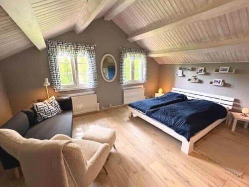 Giường trong phòng chung tại VGO789-Svenljunga-Revesjoe-Sjoekullen-1